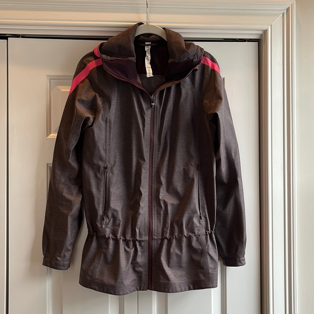 lulu lemon water repellent wind breaker; hooded, adjustable waist line
